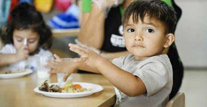Children eating lunch at Neighborhood House Association, San Diego, California