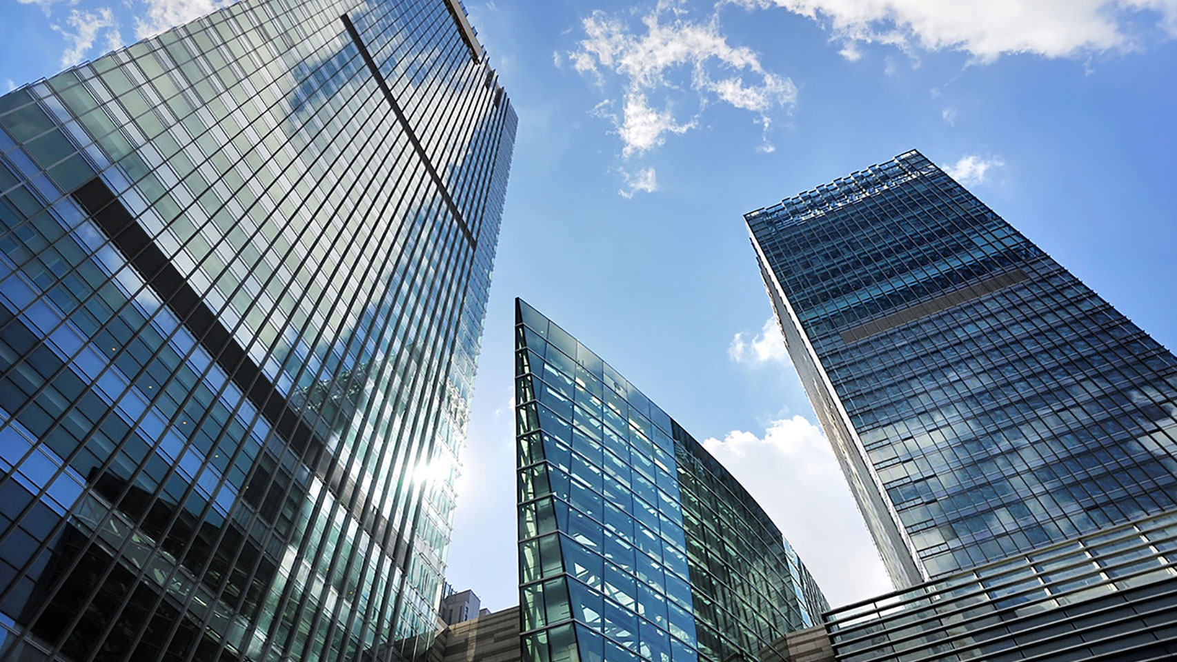 View of 3 skyscrapers from the ground