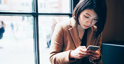 Woman looking at a cell phone