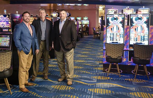 Foundation Gaming team posing in a casino