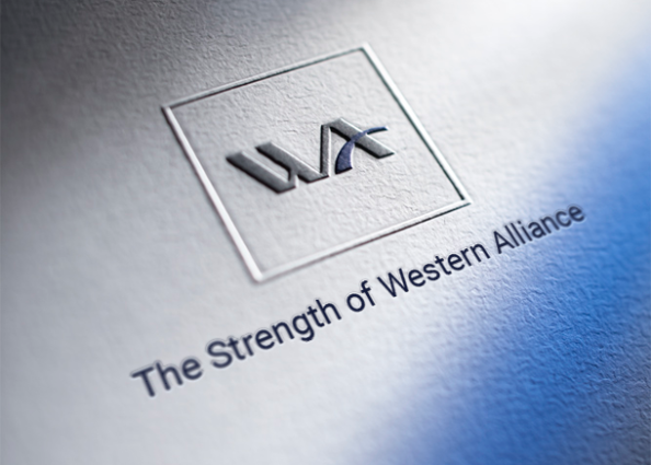 A close up of a raised emboss Western Alliance Bank logo and the tagline The Strength of Western Alliance.