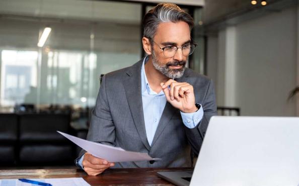 An accountant paying invoices